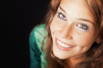 Face closeup of happy woman with perfect smile