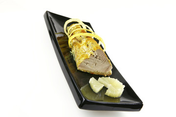single tuna served on plate