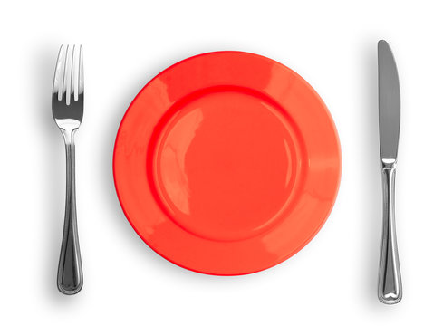 Knife, red plate and fork isolated