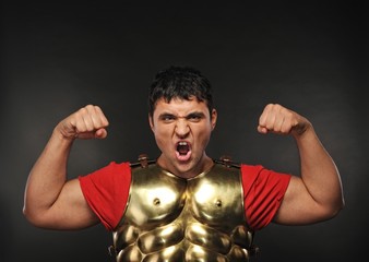 Legionary soldier showing his strength