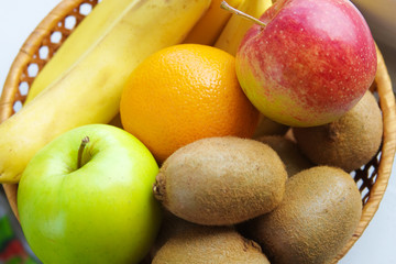 fruit are in a small basket