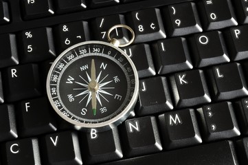 computer keyboard and compass