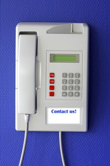 Wall phone on blue background