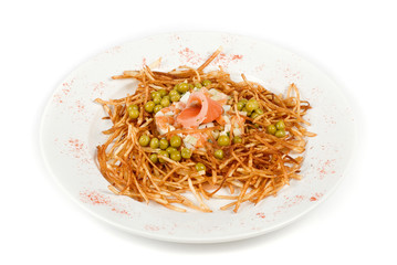 Russian salad with salmon fish closeup