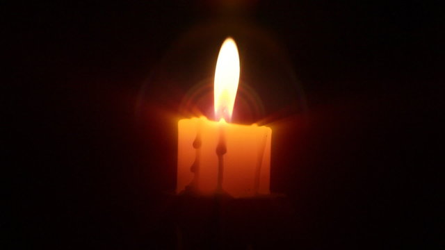 Candle in the dark, close up