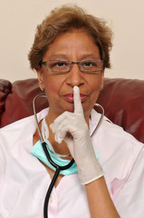 Mixed raced nurse with stethoscope