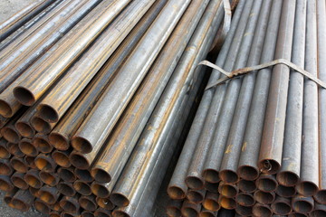 Steel high-pressure pipes bunches in warehouse