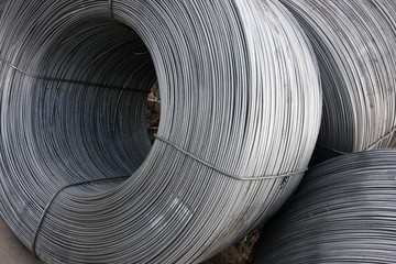 Close-up of stainless steel wire coils in warehouse