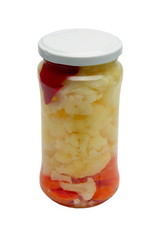 Glas jars with marinated vegetables  isolated on the white backg