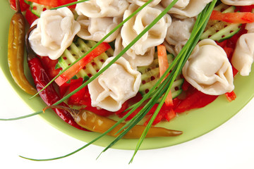 dumplings served on green plate