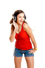 Naklejka premium Young girl listen music
