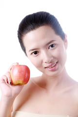 Close-up portrait of sexy asian young woman holding one apple