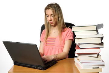 Girl writing on a computer