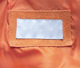 Original background in the form of a label on clothes