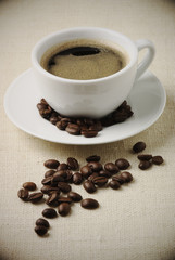 Cup of coffee and beans