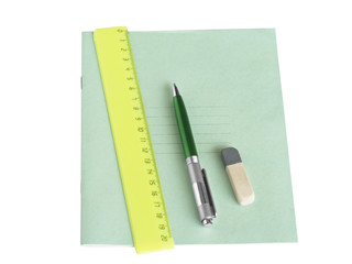 School writing-book, ruler and pen