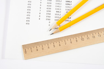 Ruler and two pencils isolated on white background