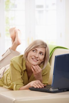 Woman chatting online on computer
