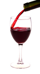 Red wine pouring from a wine bottle