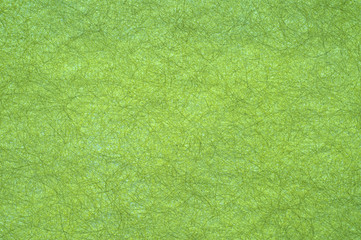 textured paper in shades of yellow and green