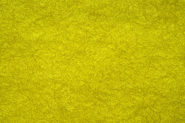 textured paper in shades of yellow and green