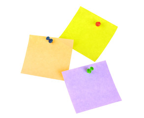 Three sticker notes with pins