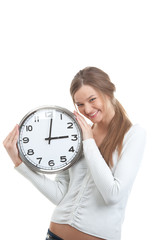 Portrait of a smiling girl holding clock