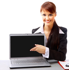 Businesswoman working at desk, isolated on white..