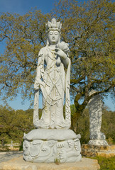 Fototapeta na wymiar Buddhist Garden - Statue