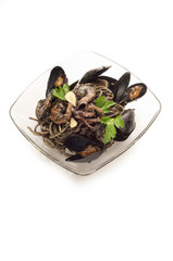 Ink squid spaghetti on white background