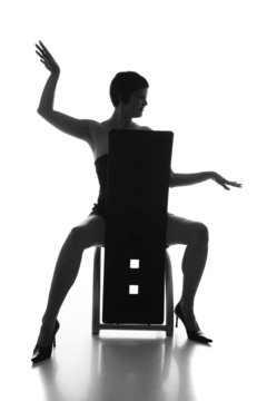 young woman sitting on a chair