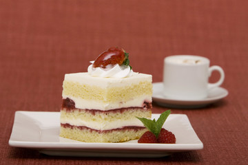 Slice of strawberry or raspberry cake