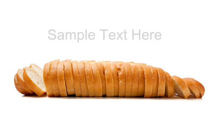 Sliced baked french bread on white