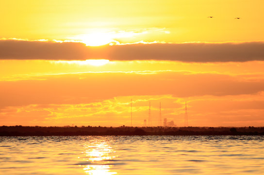 sunrise at a space shuttle launch pad