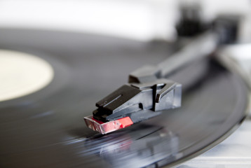 Vinyl record spinning on turntable