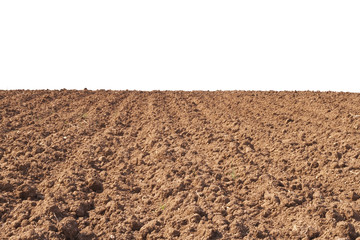 Plough soil isolate on white. Countryside.