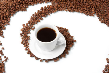 Cup with coffee, costing on coffee grain