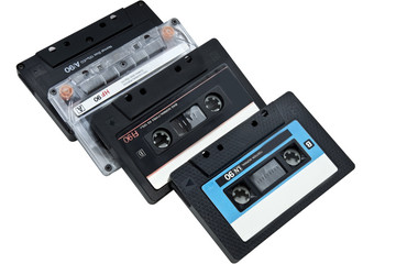 four audiocassettes isolated on a white background