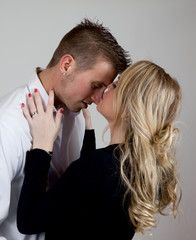 Lovers kissing affectionately