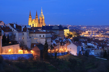 Fototapeta na wymiar The night View on bright Prague with gothic Castle