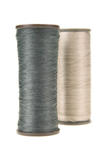 large spools of thread on a white background