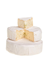 Stacked round cheese blocks.