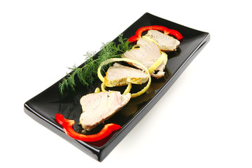 tuna slices served on white