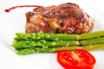 beef meat served on white