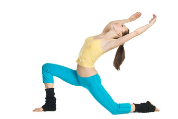 beautiful girl doing gymnastics on white background