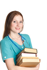 Portrait of female doctor with books