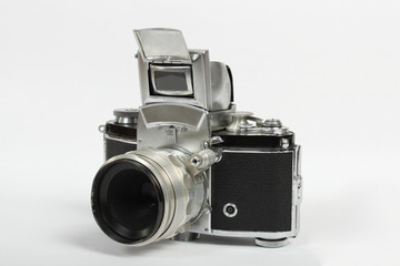 retro old vintage analog photo camera on white
