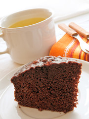 Chocolate Cake Slice on white dish.