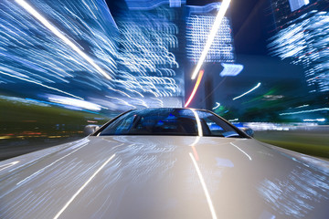 Obraz premium The car moves at great speed at the night.