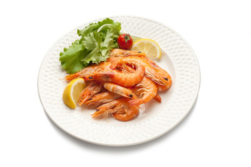 dish with boiled shrimp and sala